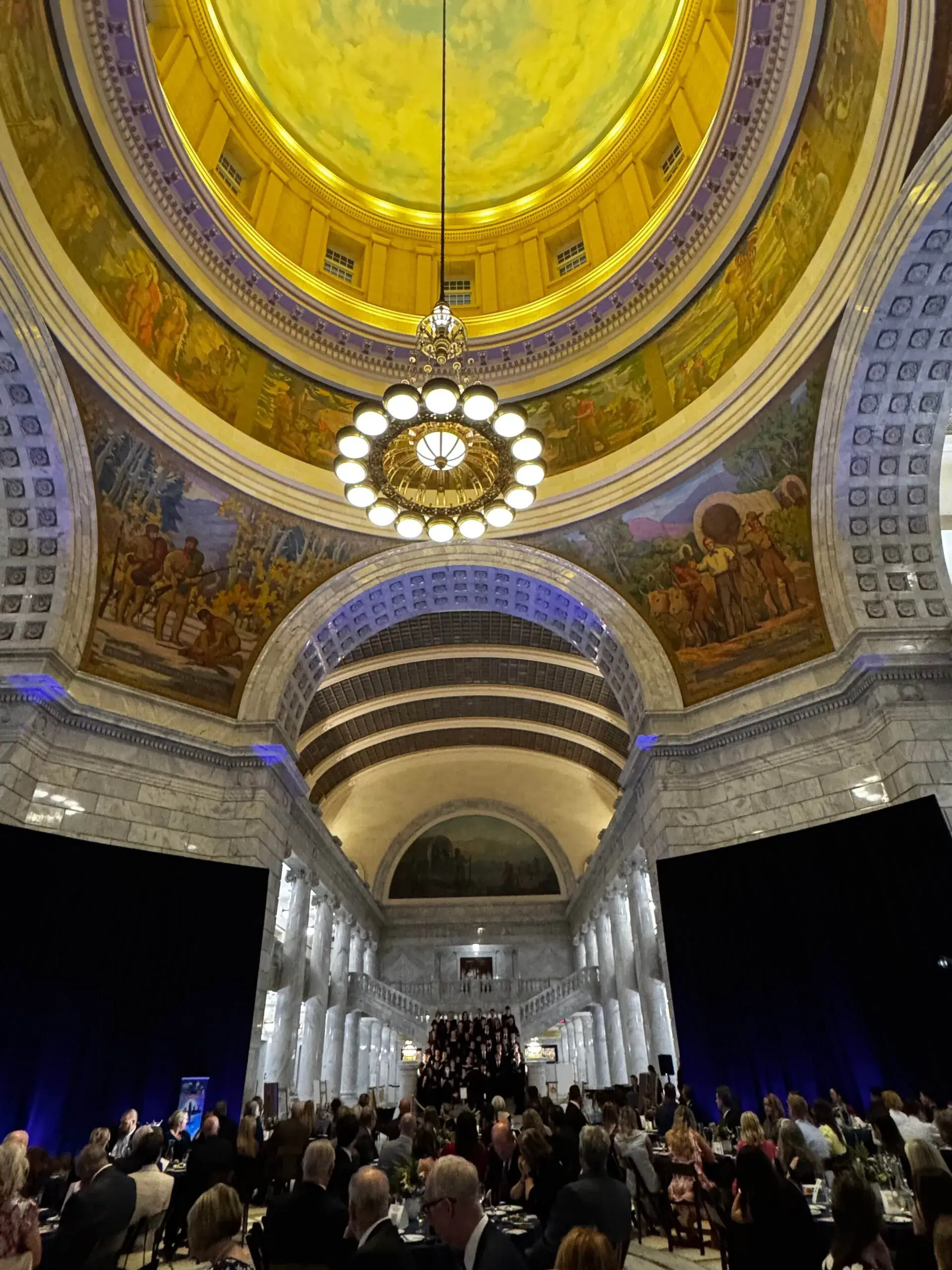 Formal gala event beneath the illuminated rotunda of the Utah State Capitol