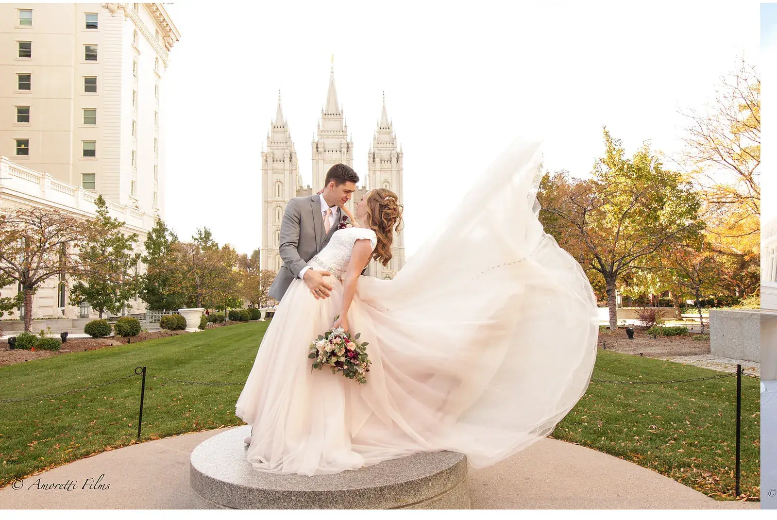 Bride's dress swirling outside the Salt Lake temple